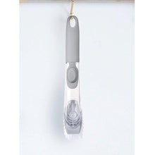 Liquid dispensing dish brush